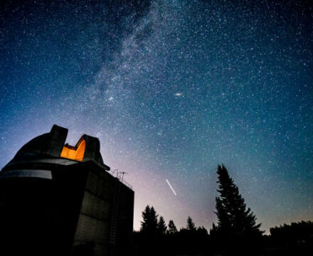 Milky way galaxy over observatory